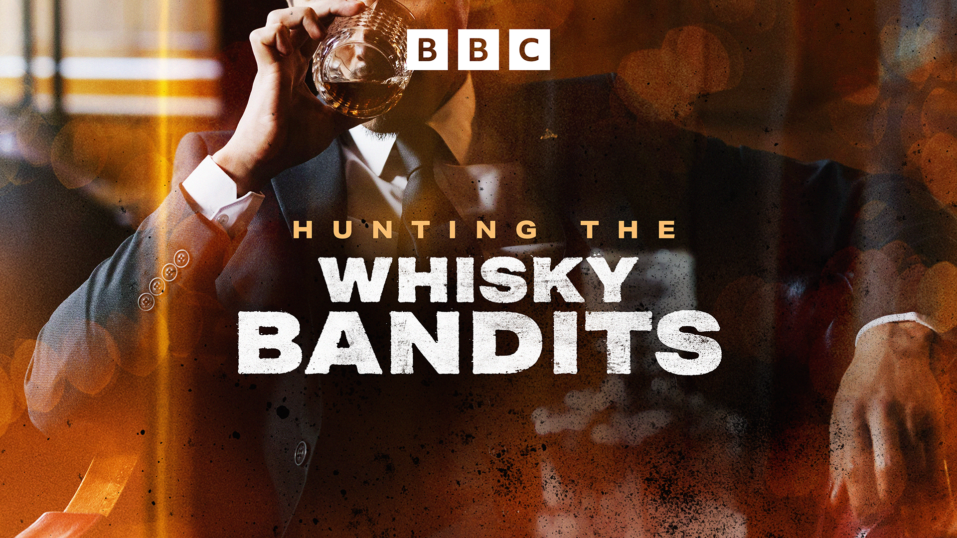 The artwork for Hunting the Whisky Bandits showing the title of the programme in front of a well-dressed man in a suit drinking a glass of whisky.